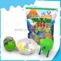 Dinosaur toy egg with tattoo and candy 